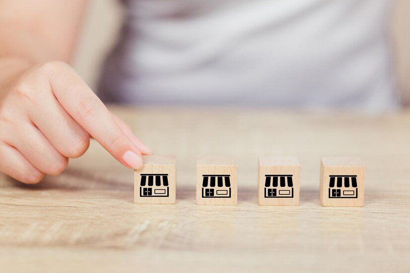 close-up-hand-holding-toy-table_1048944-19045277